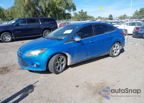 2014 Ford Focus Titanium z USA, uszkodzony, nr VIN 1FADP3J24EL138408